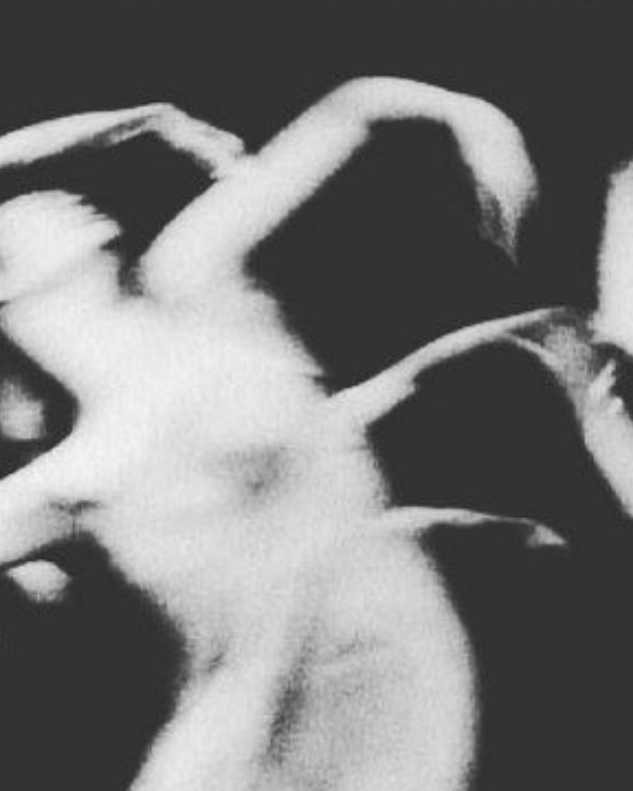 Blurred black and white dancers in motion