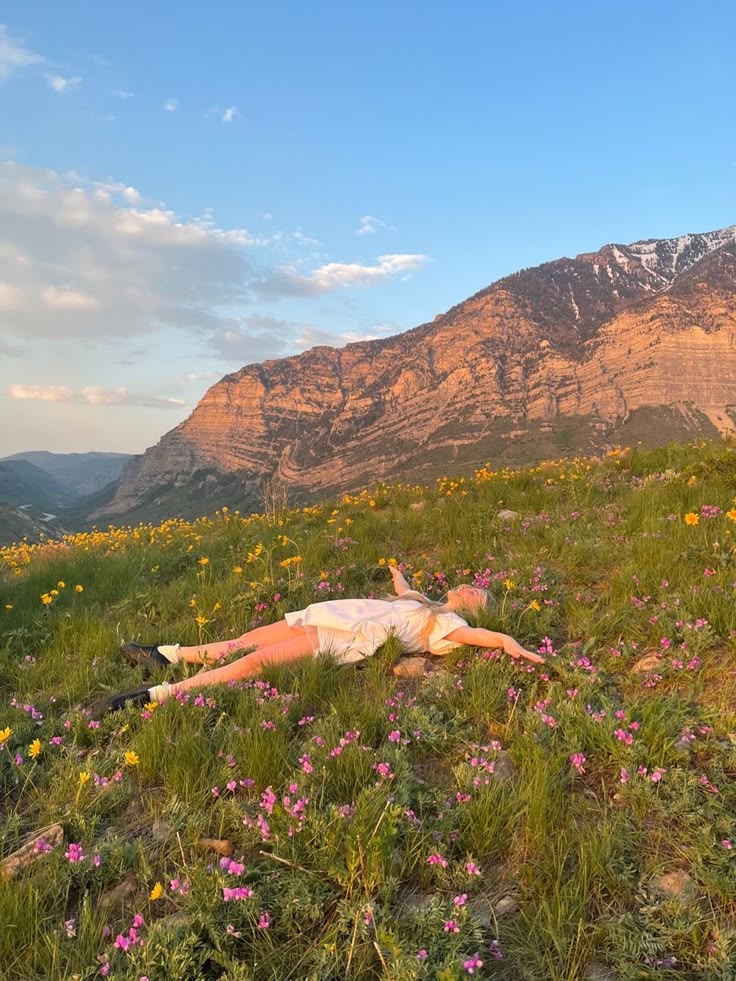 Drop hero image — sunlit water, wildflower field, or woman in nature